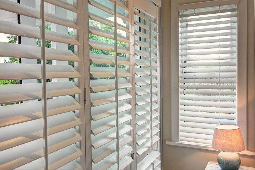 Wooden window shutters in modern interiors